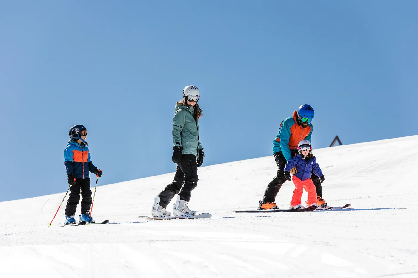 A family skiing at Pal
