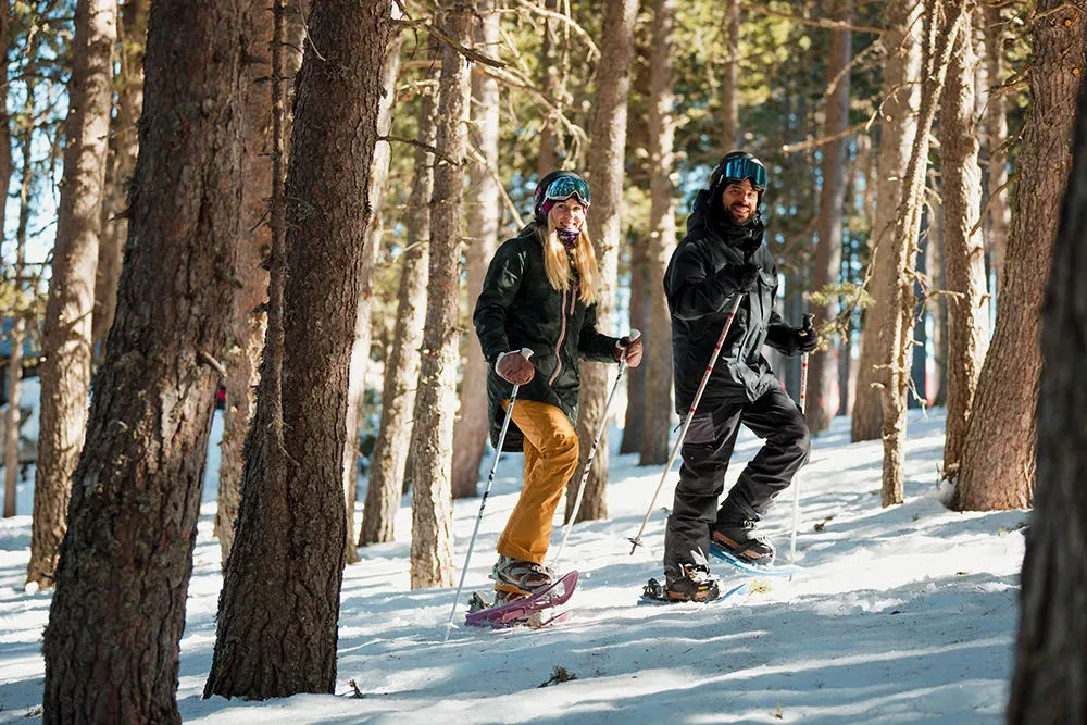 Snowshoeing through the forest at Vallnord