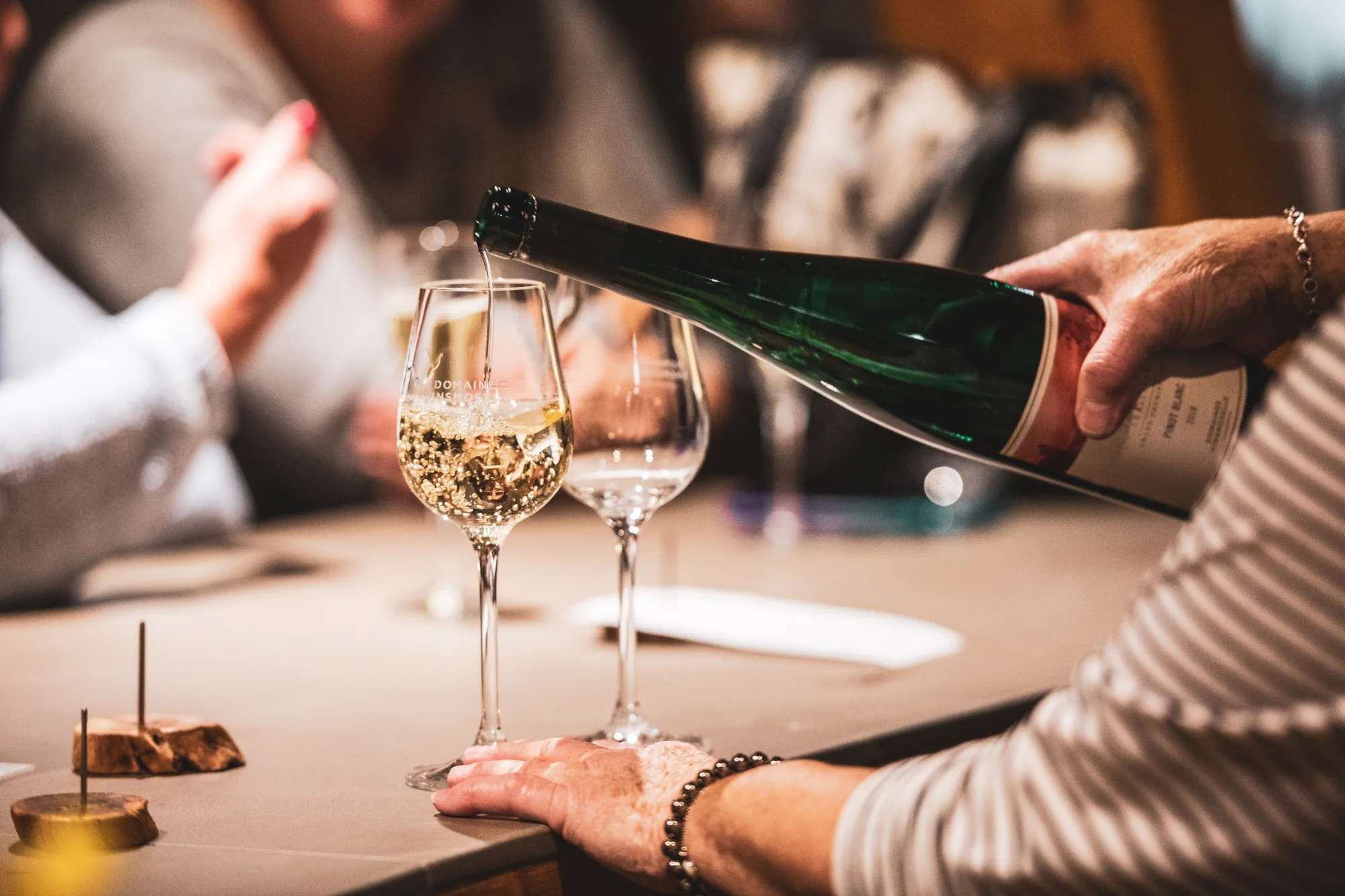 Sparkling wine being poured into glasses